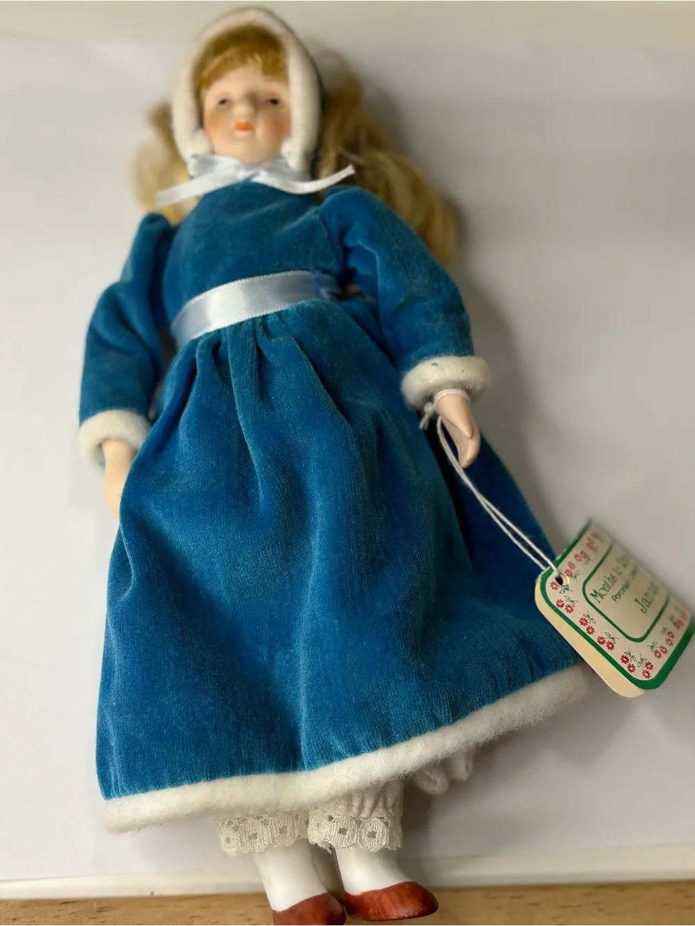 Porcelain Doll in Blue Velvet Dress with White Trim